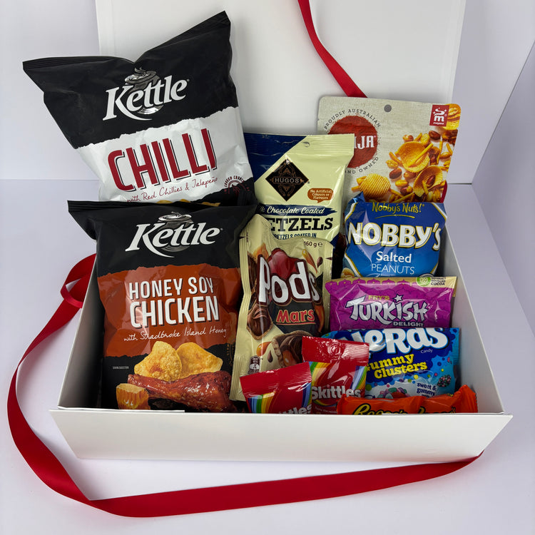 Gift box including crisps, beer mix, chocolate pretzels, sweet lollies and chocolates